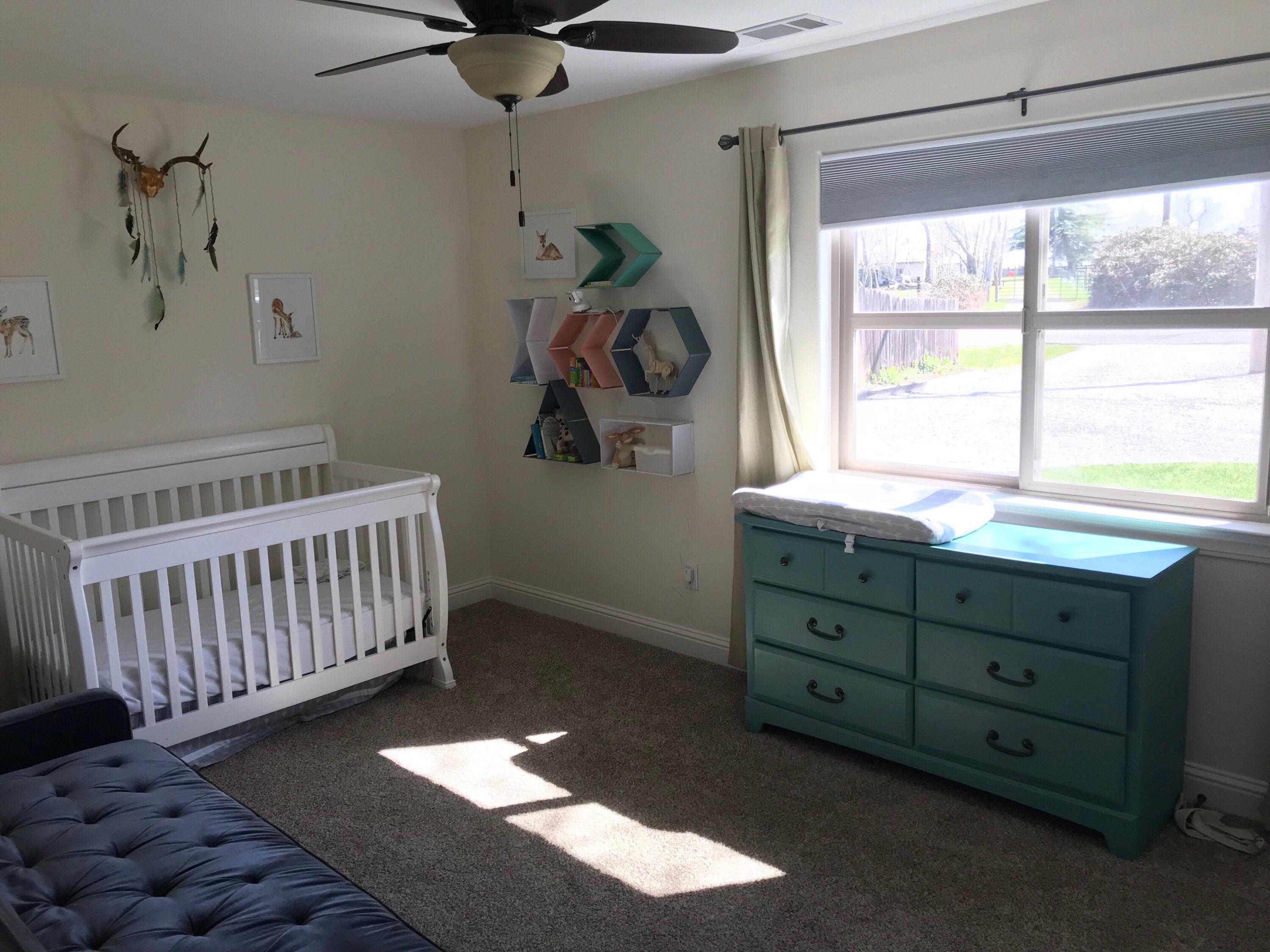 21710 Lone Tree Road Anderson, CA 96007 - Photo 9 of 16 a bedroom with a window and a ceiling fan
