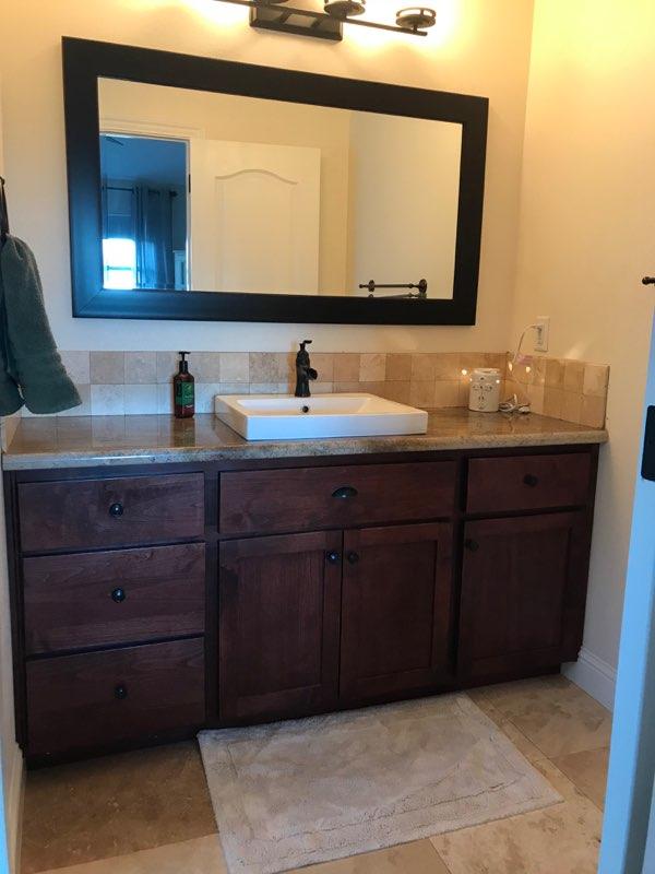 21710 Lone Tree Road Anderson, CA 96007 - Photo 10 of 16 a bathroom with a sink vanity and mirror
