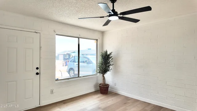 a view of a kitchen with a refrigerator a sink and dishwasher