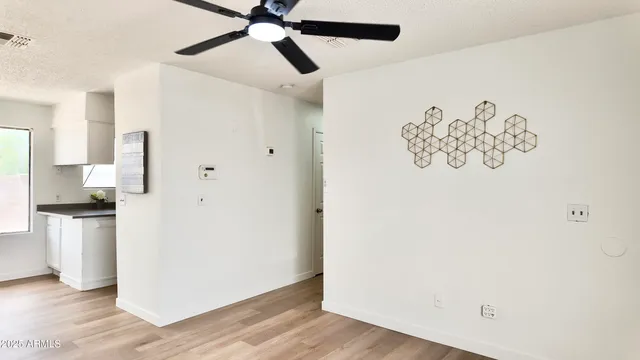 a view of a hallway view with staircase