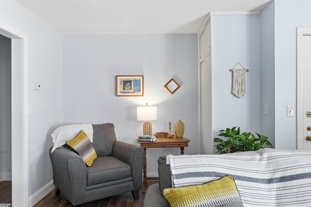 45 Doverbrook Road, Unit 45 Chicopee, MA 01022 - Photo 19 of 33 a living room with furniture and a potted plant