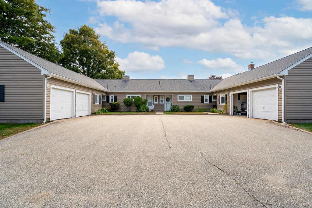 45 Doverbrook Road, Unit 45 Chicopee, MA 01022 - Photo 3 of 33 a view of a house with a street