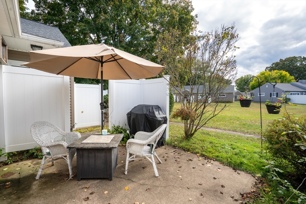 45 Doverbrook Road, Unit 45 Chicopee, MA 01022 - Photo 31 of 33 a view of backyard of house with seating space