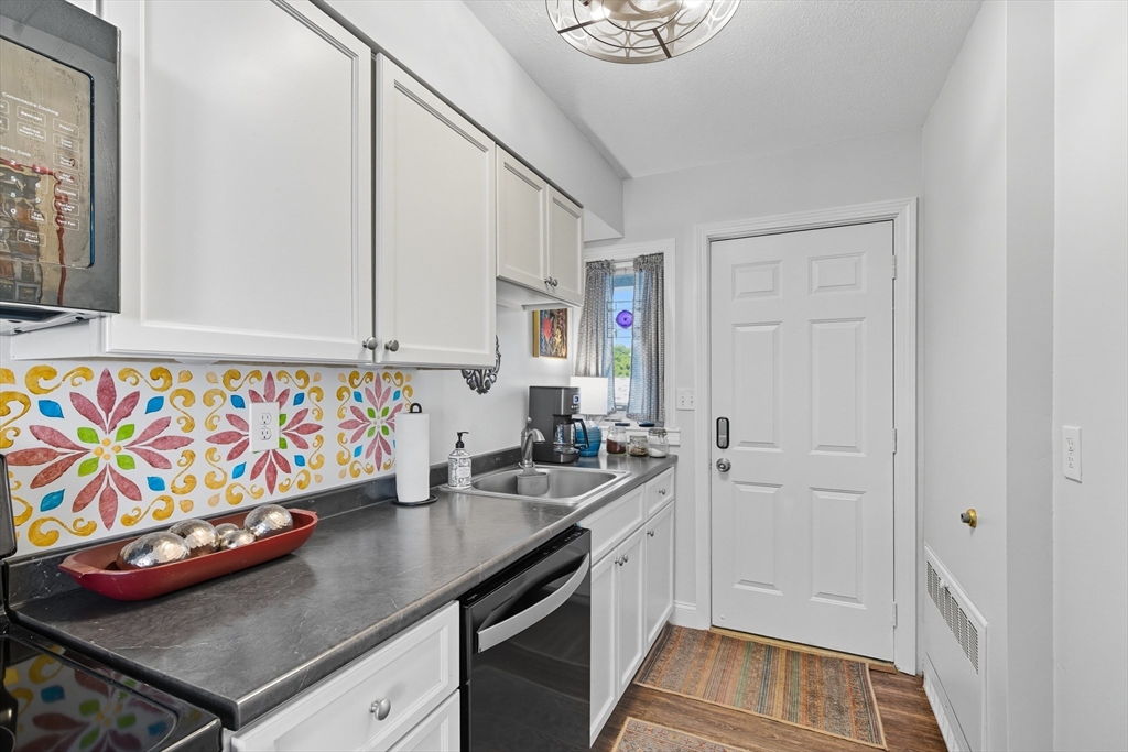 45 Doverbrook Road, Unit 45 Chicopee, MA 01022 - Photo 8 of 33 a kitchen that has a lot of cabinets in it