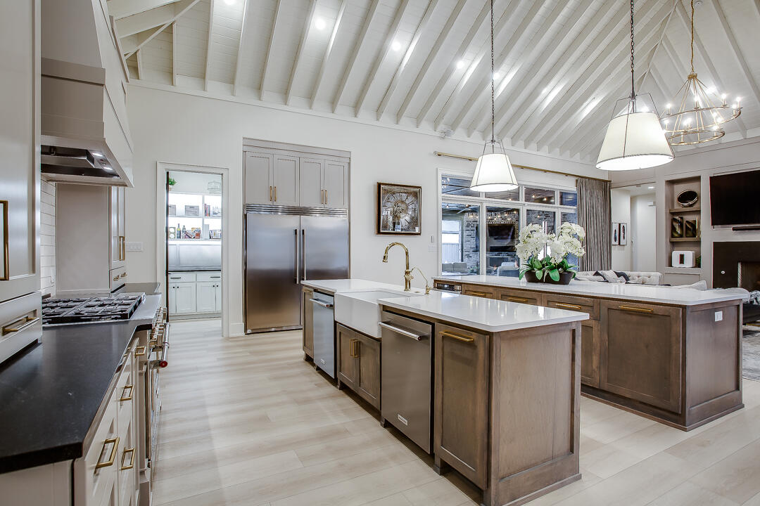4821 119th Place Lubbock, TX 79424 - Photo 16 of 77 a kitchen with stainless steel appliances granite countertop a sink and cabinets