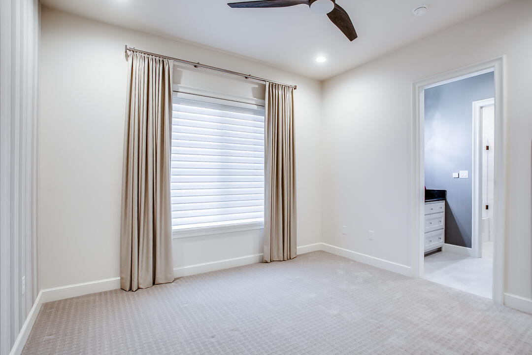 4821 119th Place Lubbock, TX 79424 - Photo 37 of 77 an empty room with a empty space and windows