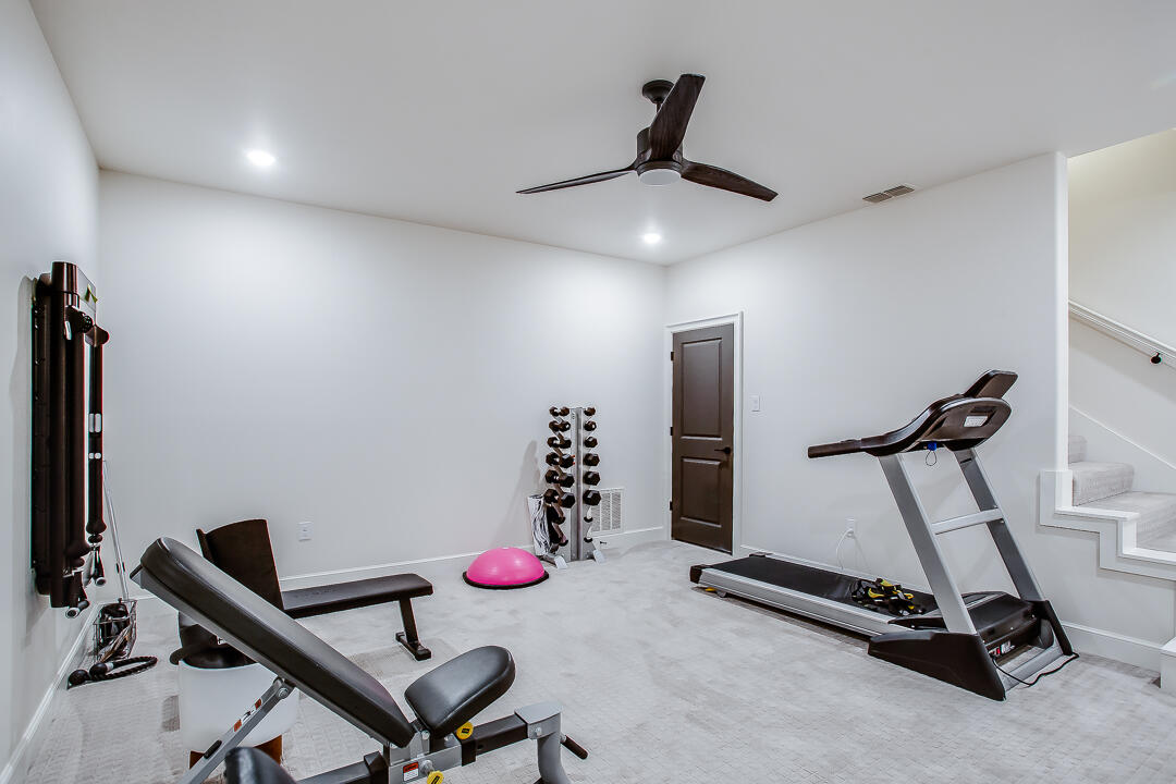 4821 119th Place Lubbock, TX 79424 - Photo 43 of 77 a view of a room with gym equipment