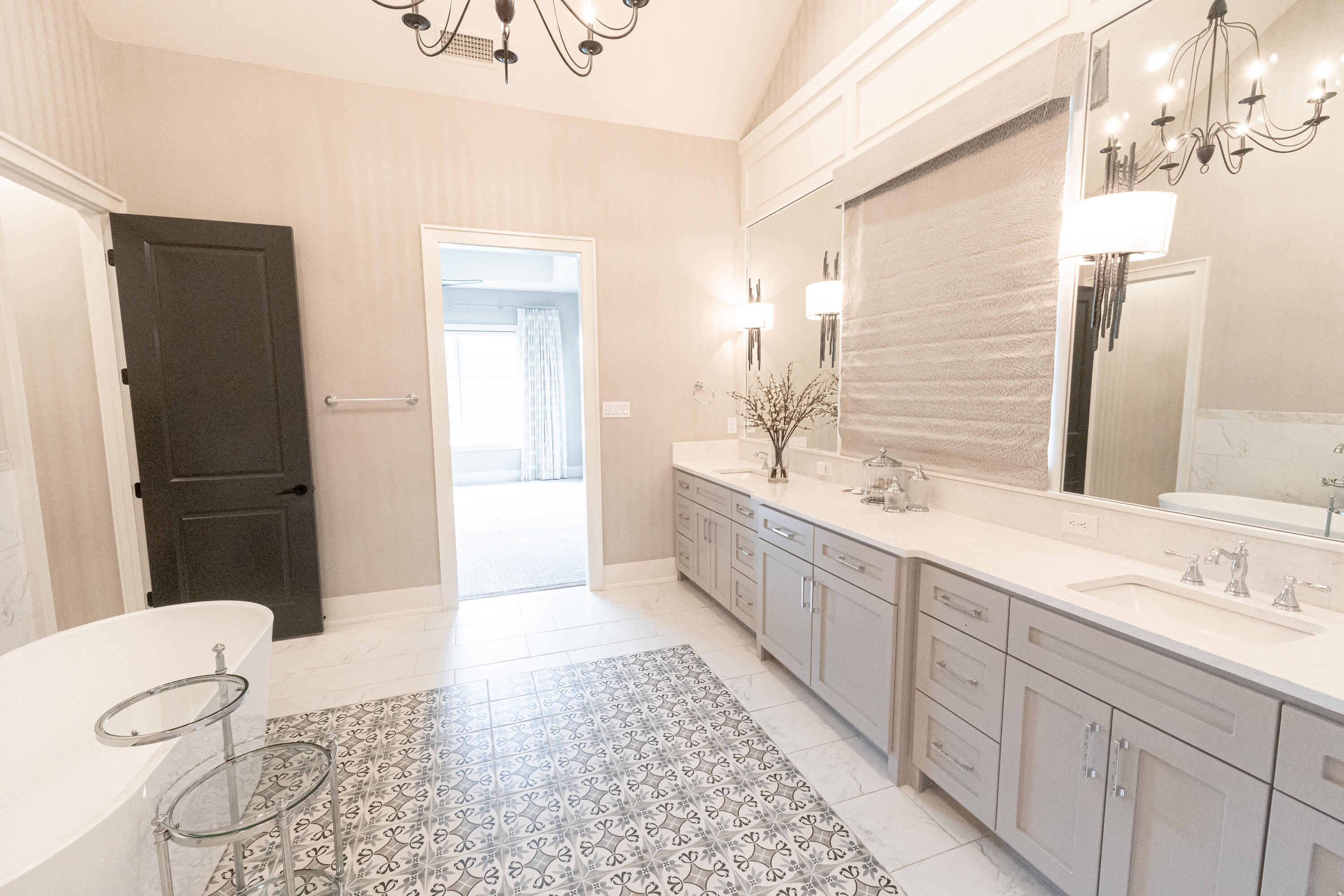 4821 119th Place Lubbock, TX 79424 - Photo 56 of 77 a spacious bathroom with a double vanity sink toilet mirror and bathtub
