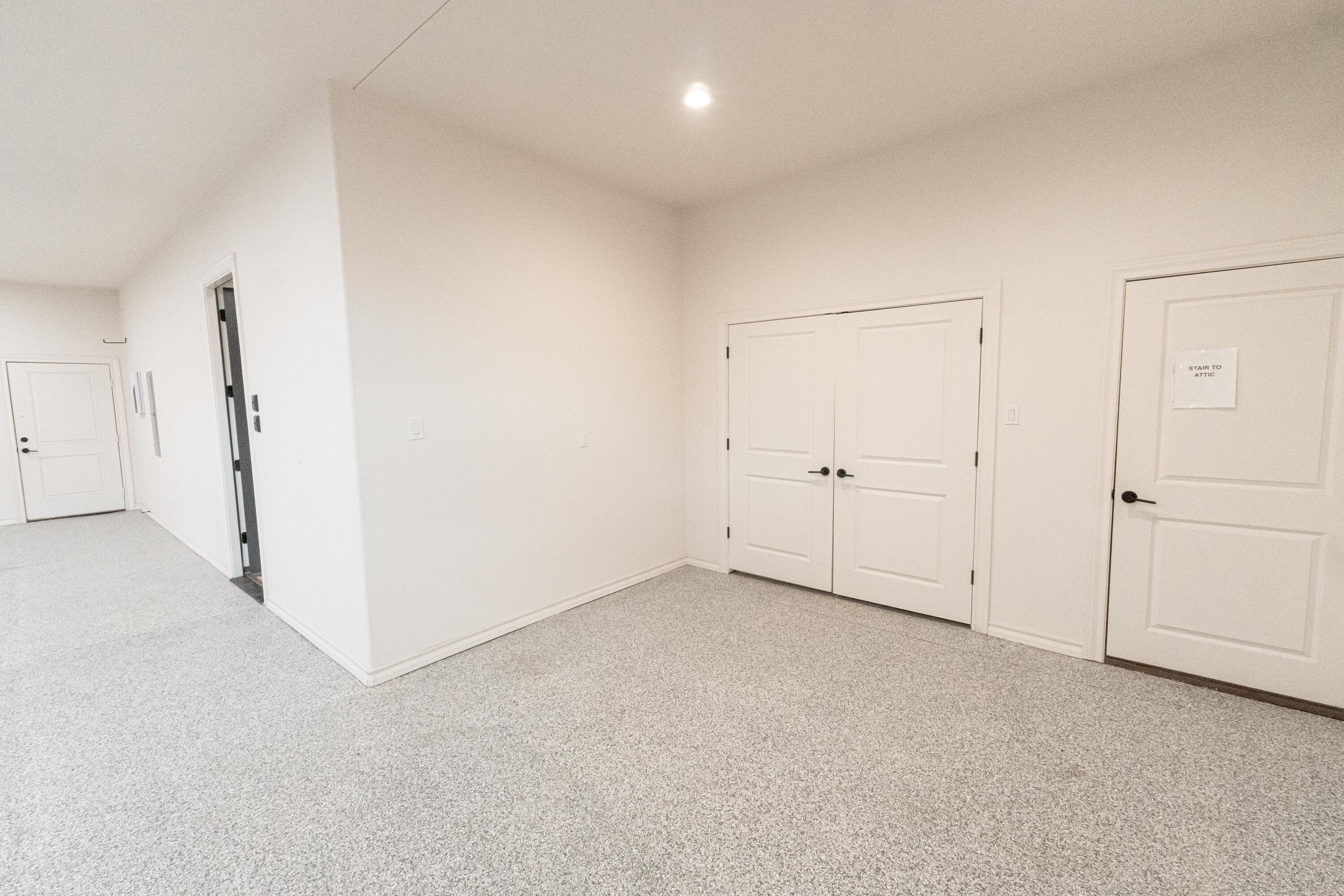 4821 119th Place Lubbock, TX 79424 - Photo 61 of 77 an empty room with white cabinet and a white refrigerator