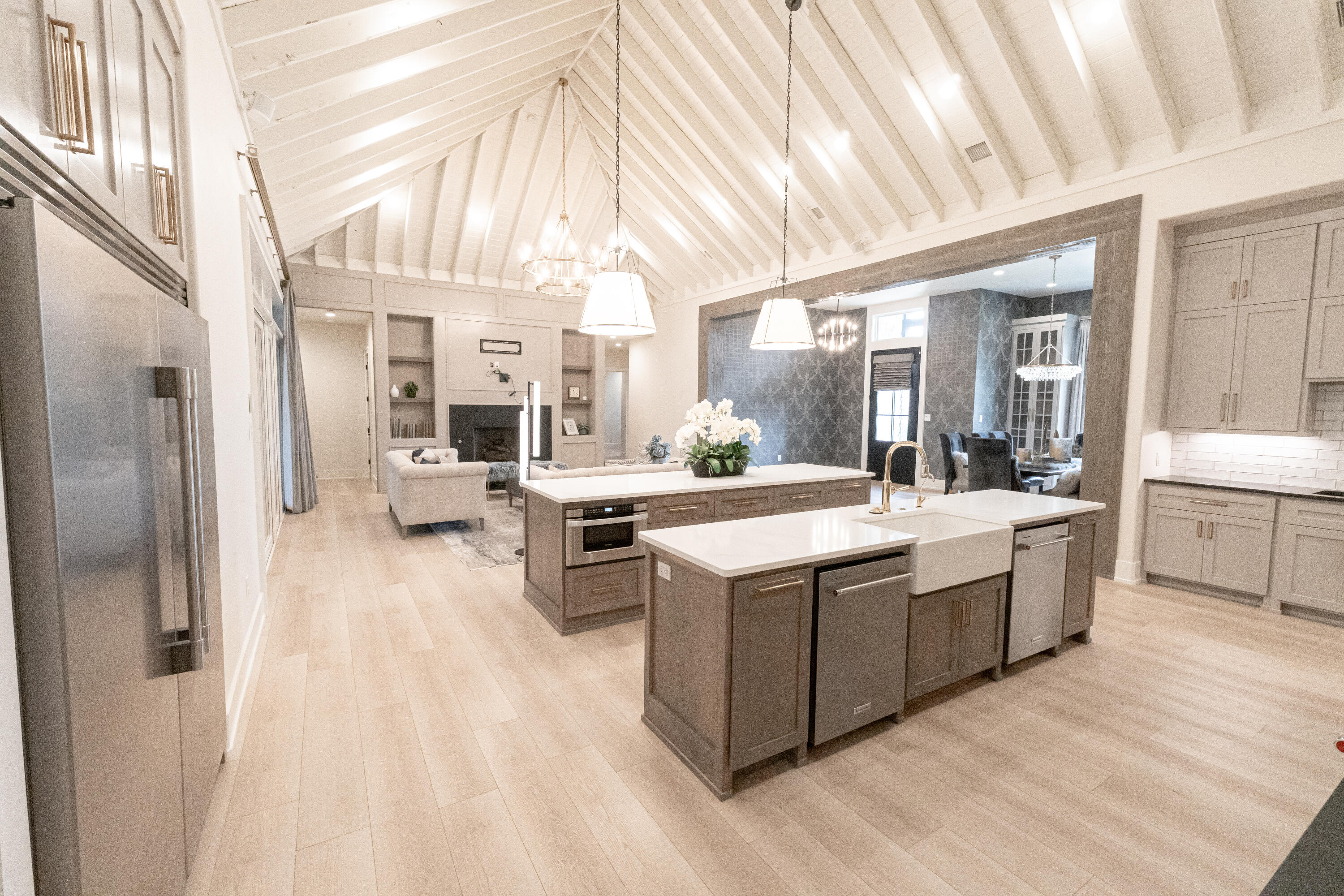 4821 119th Place Lubbock, TX 79424 - Photo 68 of 77 a large white kitchen with a large window a sink and stainless steel appliances