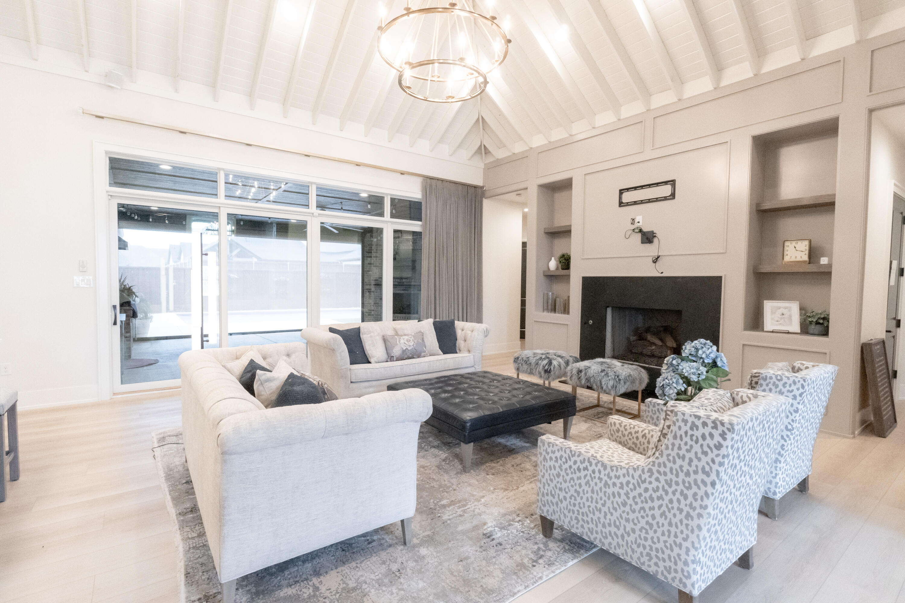 4821 119th Place Lubbock, TX 79424 - Photo 75 of 77 a living room with furniture and a fireplace