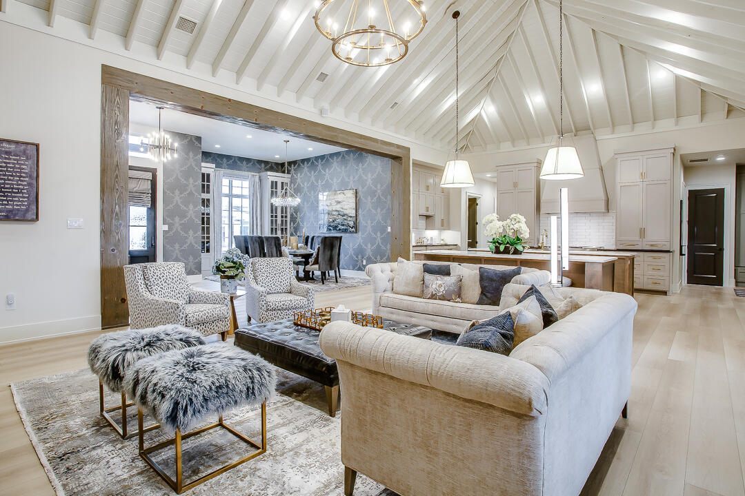 4821 119th Place Lubbock, TX 79424 - Photo 9 of 77 a living room with furniture and a chandelier