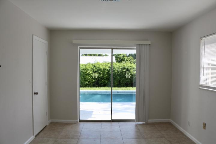 9 Burning Tree Lane Boca Raton, FL 33431 - Photo 15 of 26 a view of a room that has a window in it