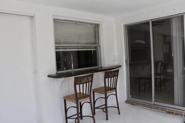 9 Burning Tree Lane Boca Raton, FL 33431 - Photo 5 of 26 a view of a front door and fire place