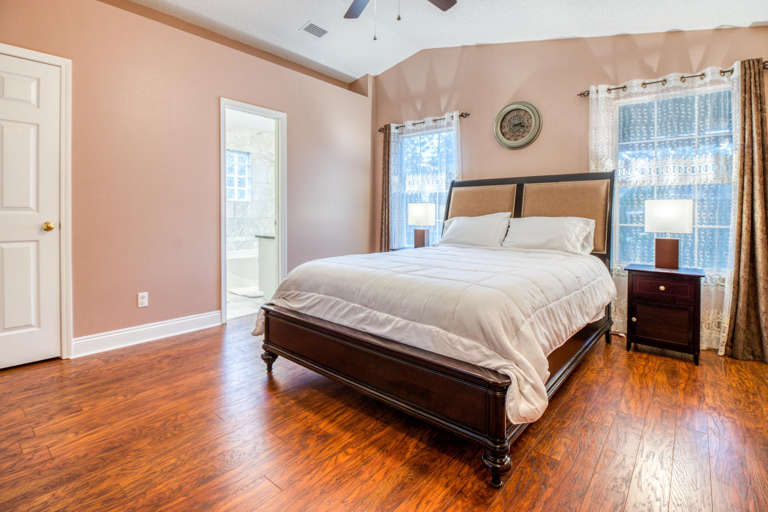 137 Pritchard Road Miramar Beach, FL 32550 - Photo 14 of 25 a bedroom with a bed and wooden floor