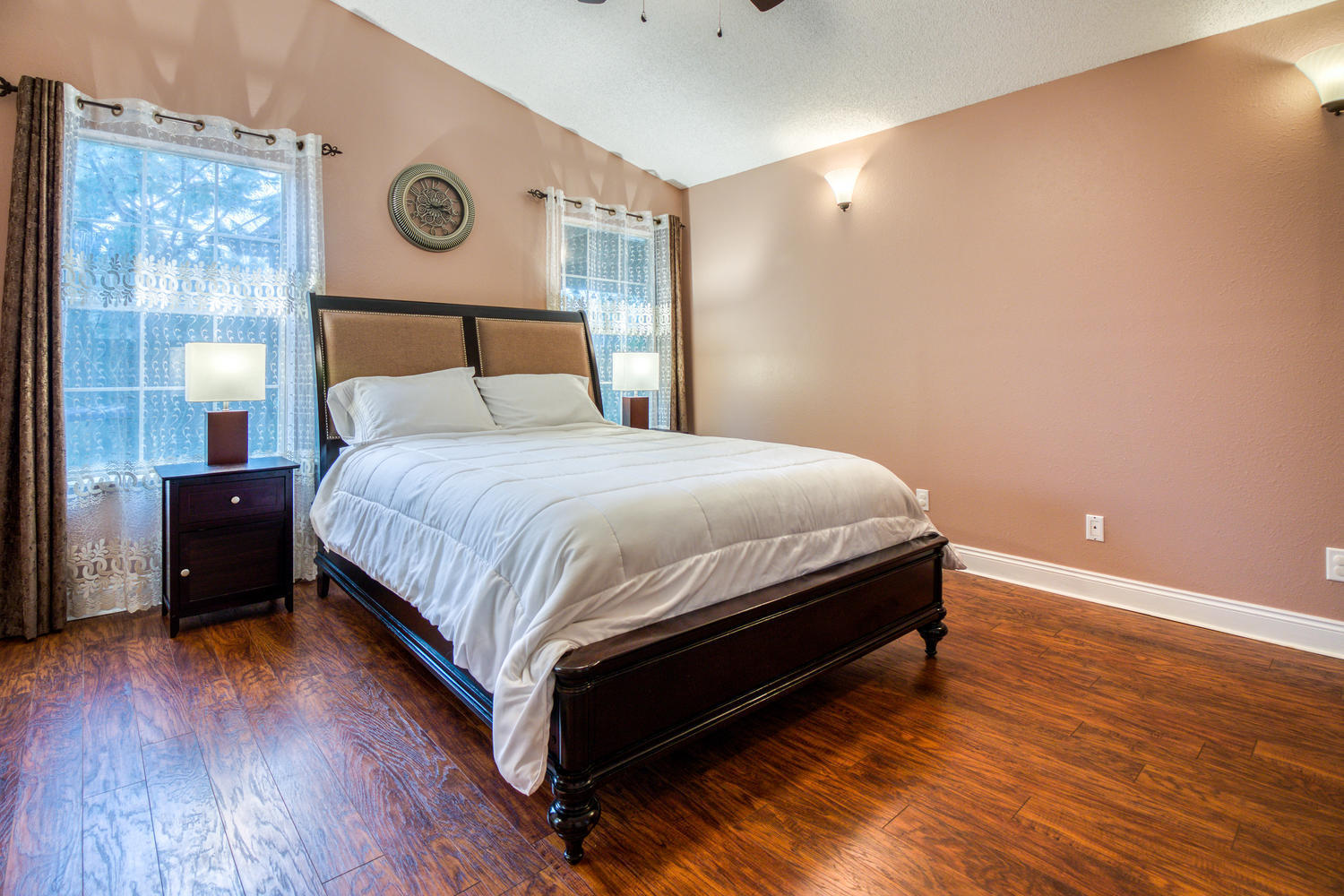 137 Pritchard Road Miramar Beach, FL 32550 - Photo 15 of 25 a bedroom with a bed and wooden floor