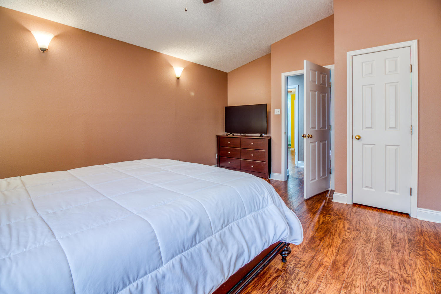 137 Pritchard Road Miramar Beach, FL 32550 - Photo 16 of 25 a bedroom with a bed and a flat screen tv