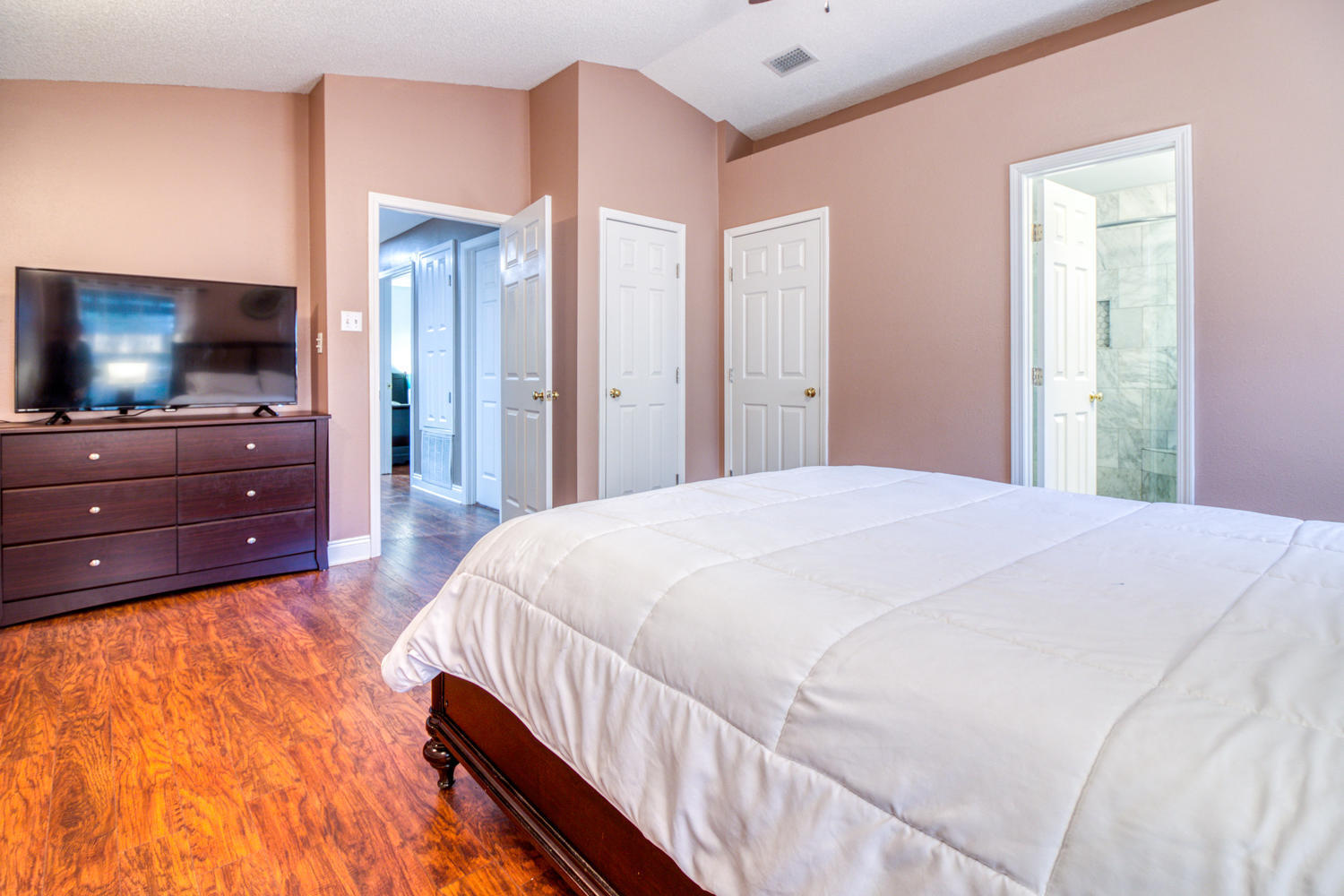 137 Pritchard Road Miramar Beach, FL 32550 - Photo 17 of 25 a bedroom with a bed and a flat screen tv