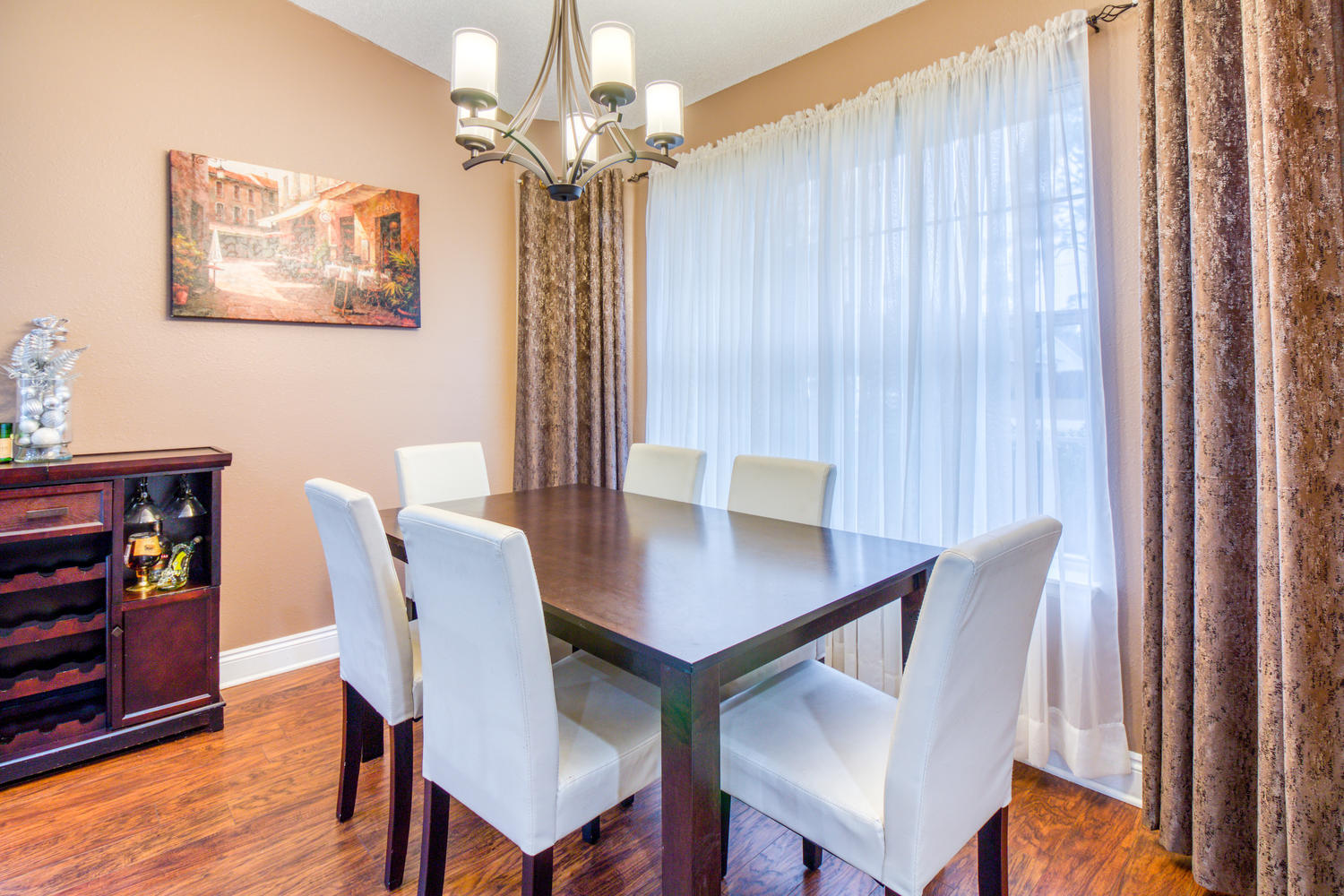 137 Pritchard Road Miramar Beach, FL 32550 - Photo 3 of 25 a view of a dining room with furniture and chandelier