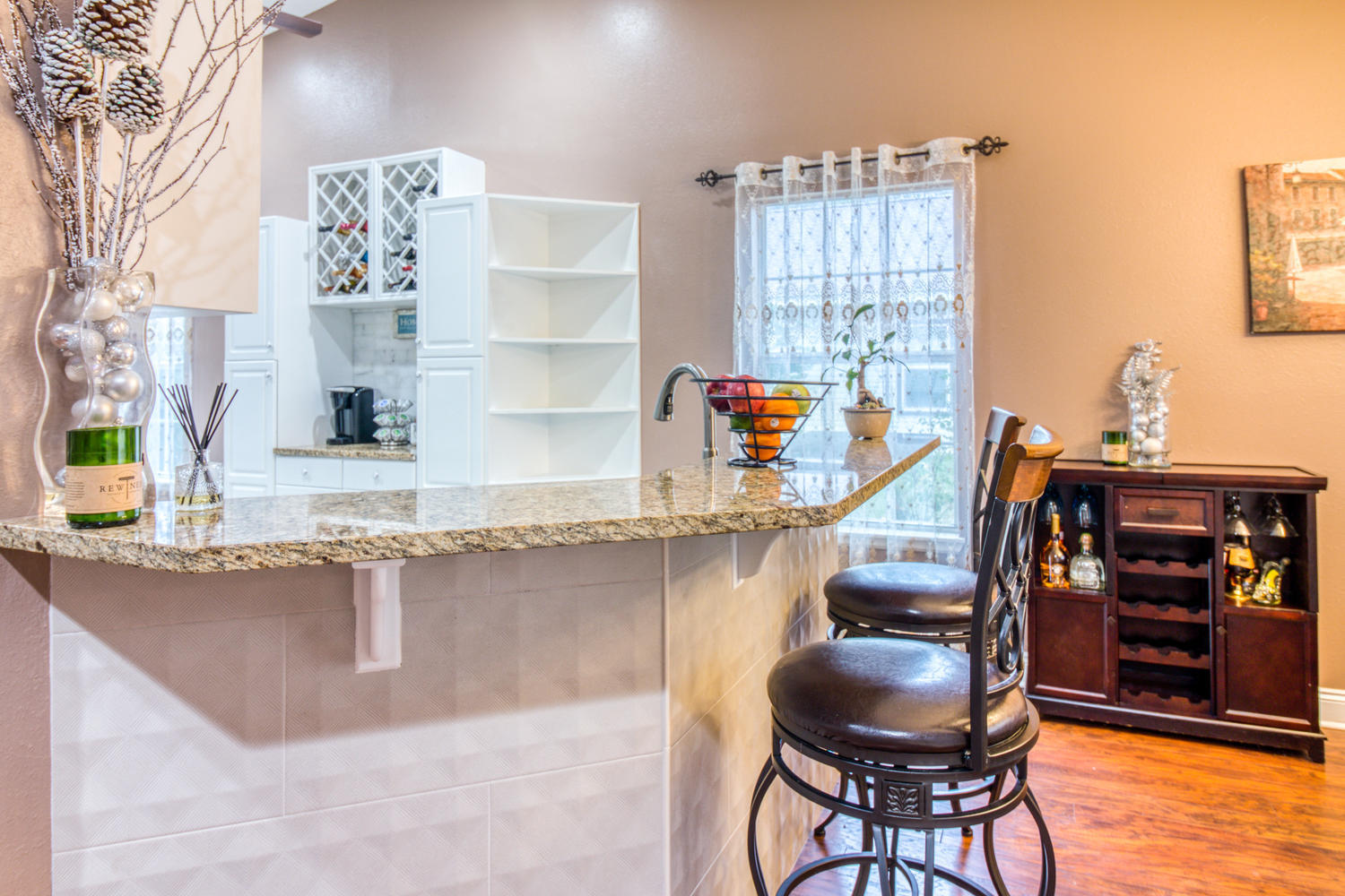 137 Pritchard Road Miramar Beach, FL 32550 - Photo 8 of 25 a kitchen with cabinets and chairs