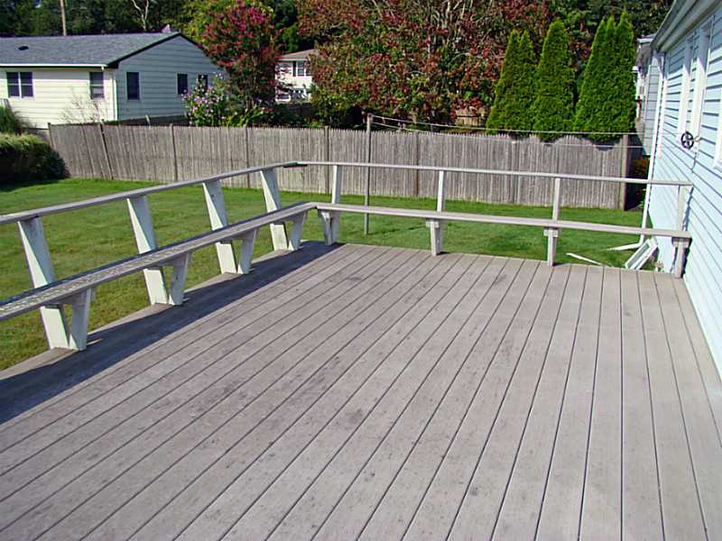 121 Ruggles Avenue Newport, RI 02840 - Photo 2 of 25 Patio/Deck. 20 X 12 Deck off the kitchen overlooks spacious backyard.