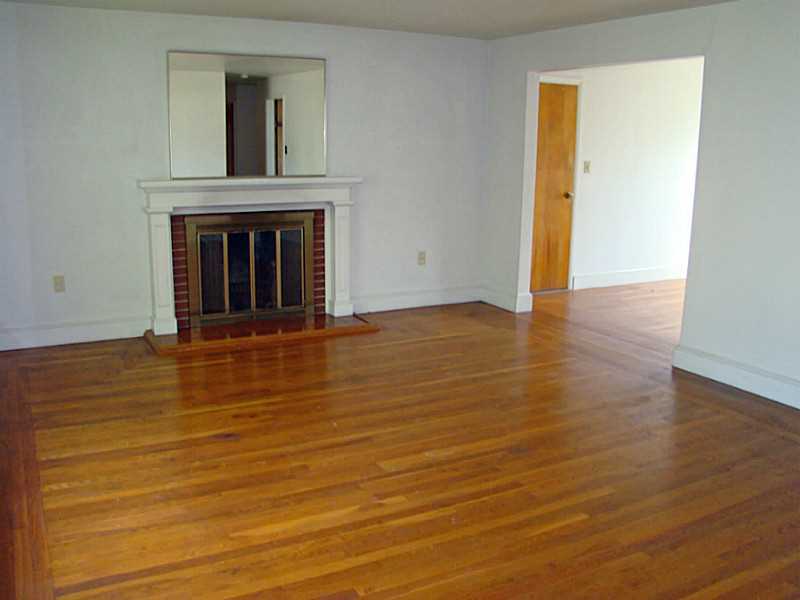 121 Ruggles Avenue Newport, RI 02840 - Photo 6 of 25 Living Room. Open to Dining Room on the right.