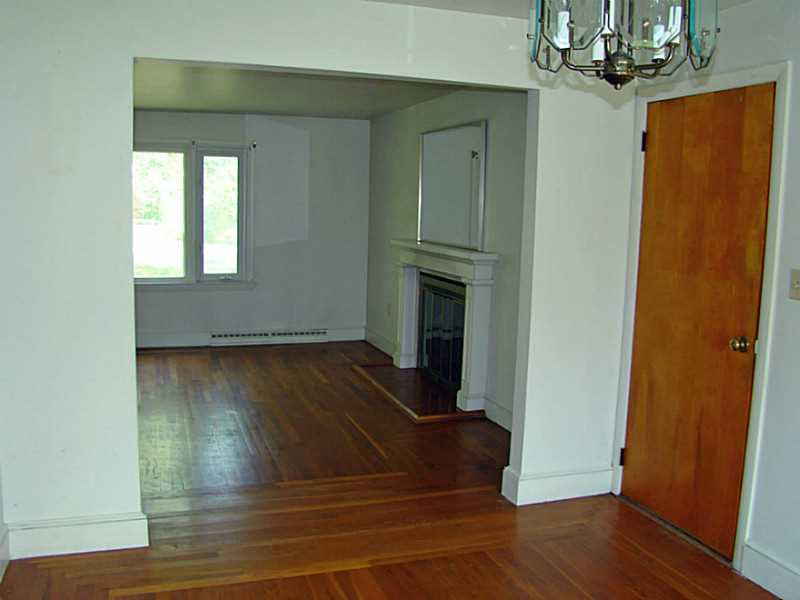 121 Ruggles Avenue Newport, RI 02840 - Photo 8 of 25 Dining Room. Looking towards living room. Door to garage on right.