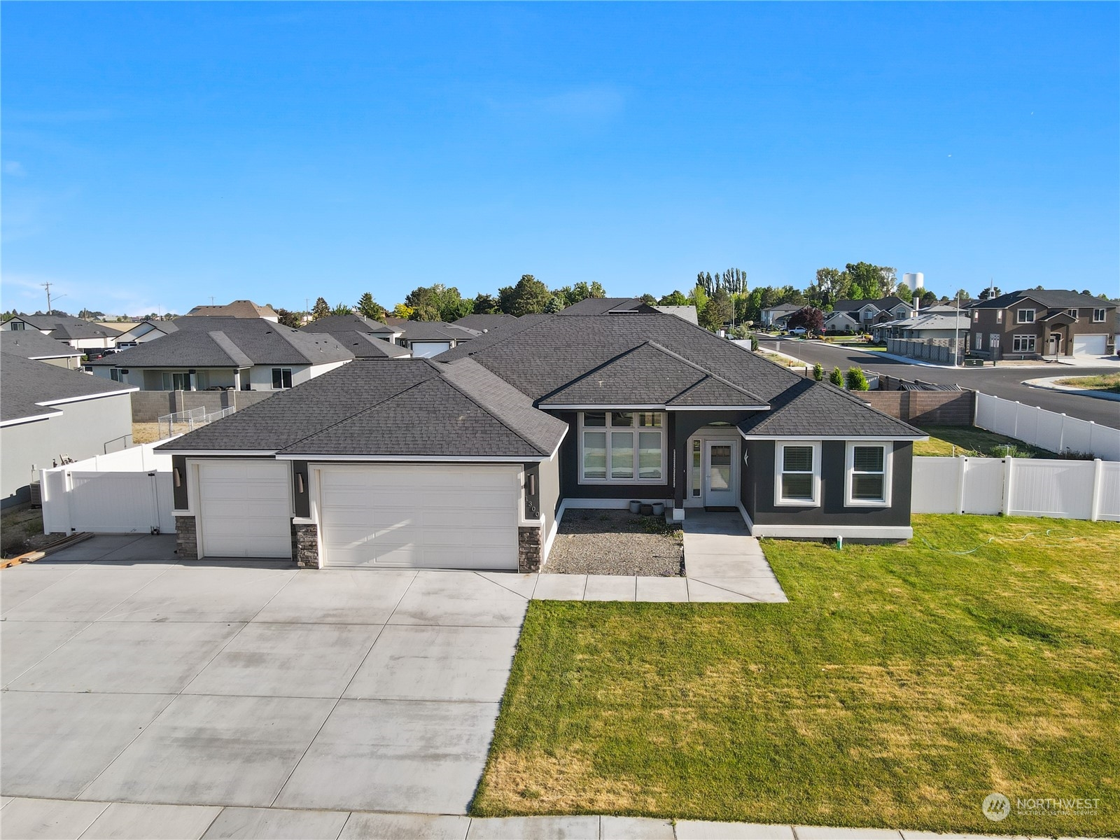 front view of a house with a yard