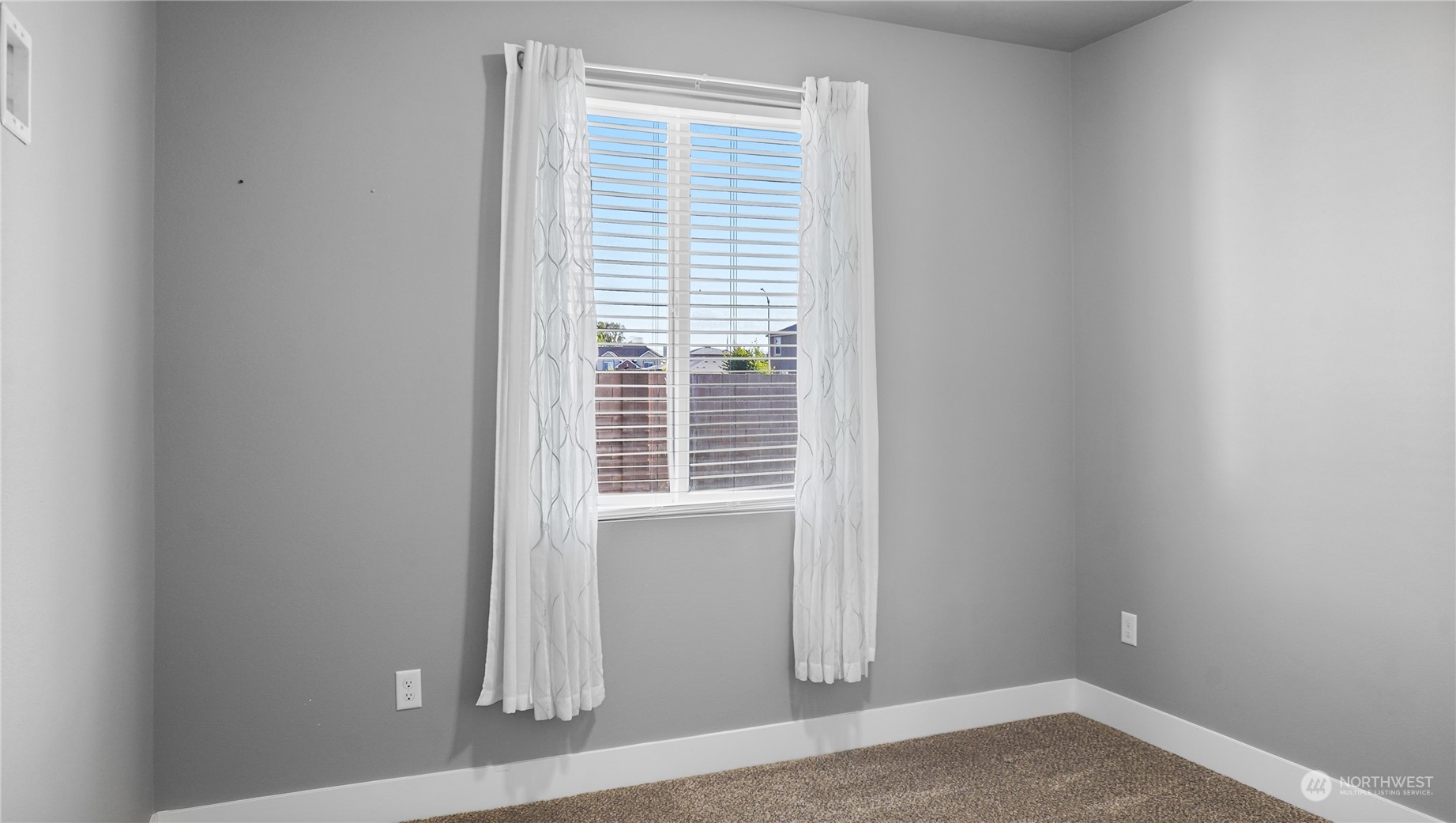 1300 E Mount Othello, WA 99344 - Photo 13 of 36 a view of empty room with wooden floor