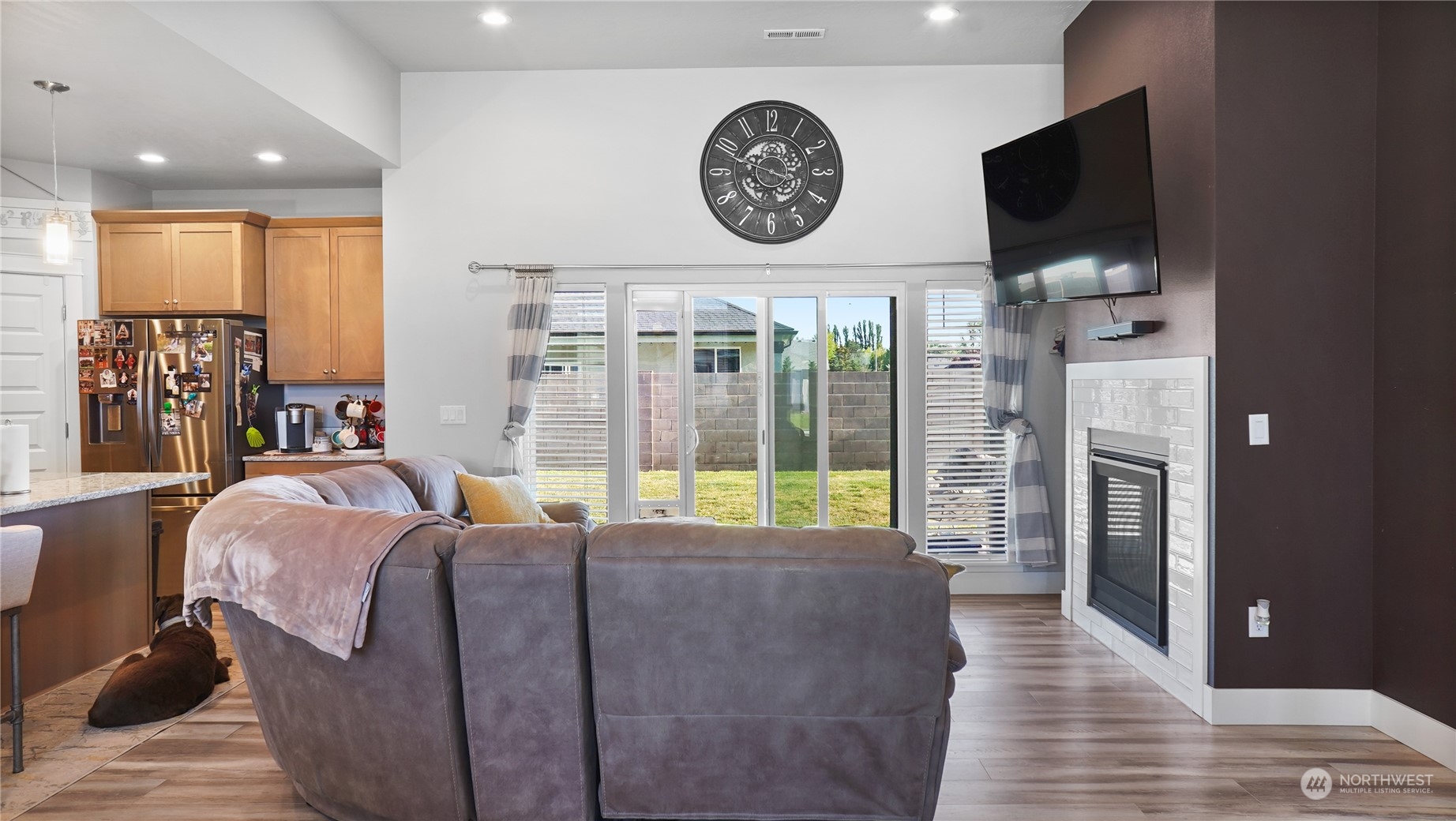 1300 E Mount Othello, WA 99344 - Photo 14 of 36 a bed room with a bed a television and a large window