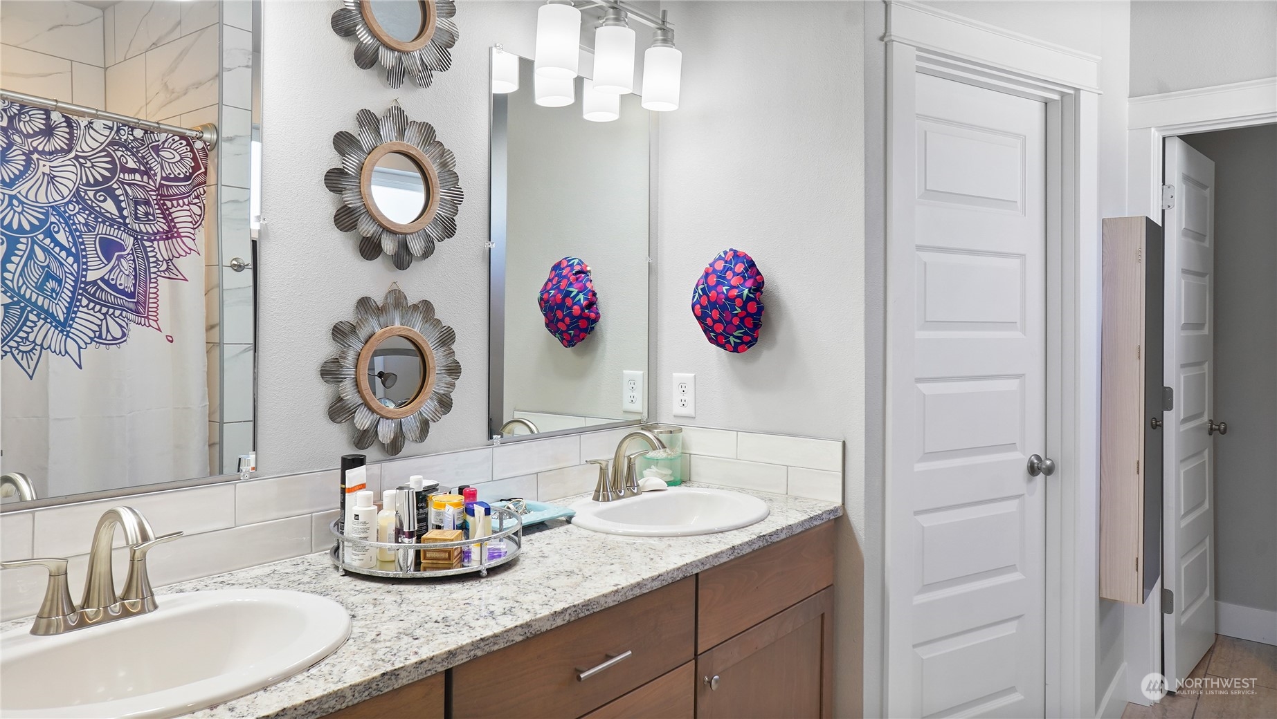 1300 E Mount Othello, WA 99344 - Photo 19 of 36 a bathroom with a granite countertop sink and a mirror