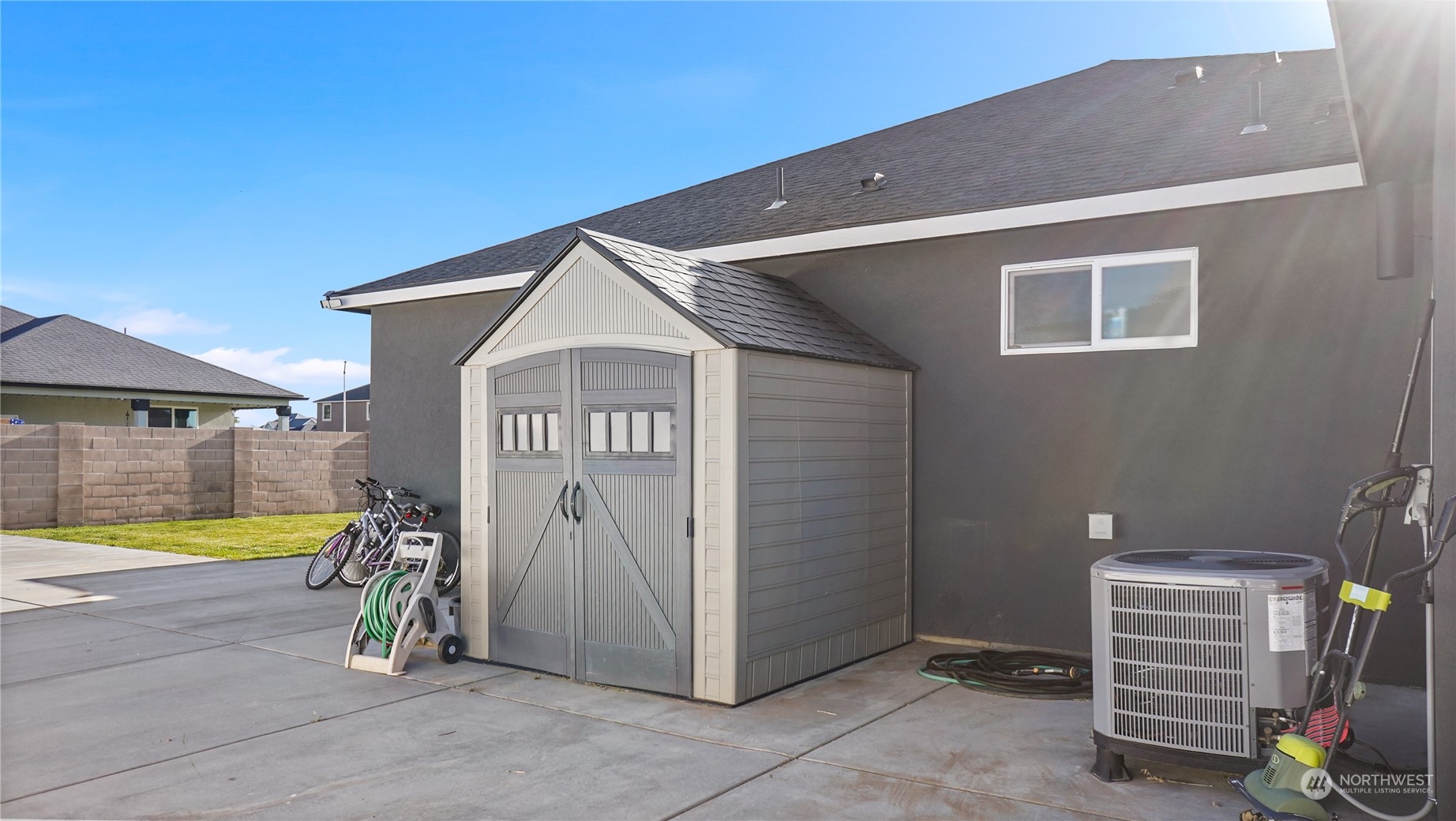 1300 E Mount Othello, WA 99344 - Photo 24 of 36 a front view of a house with a yard