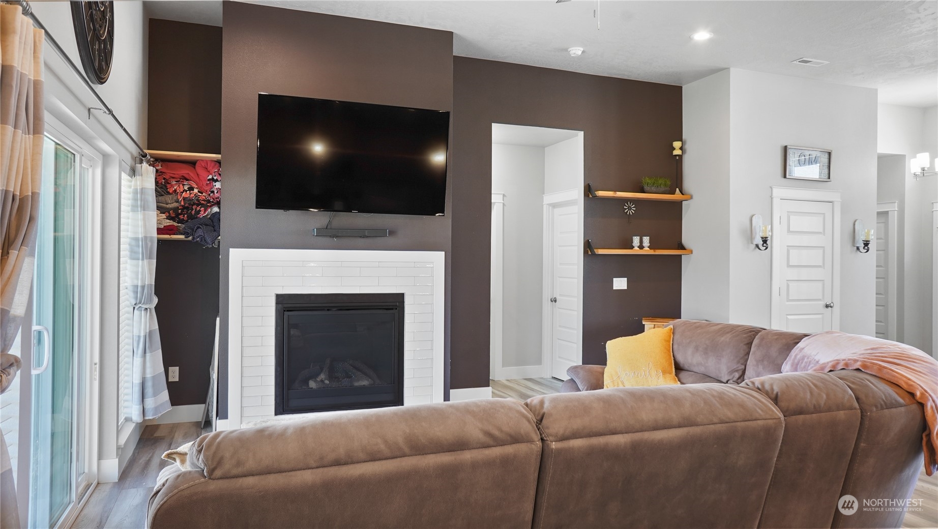 1300 E Mount Othello, WA 99344 - Photo 5 of 36 a living room with furniture fireplace and flat screen tv