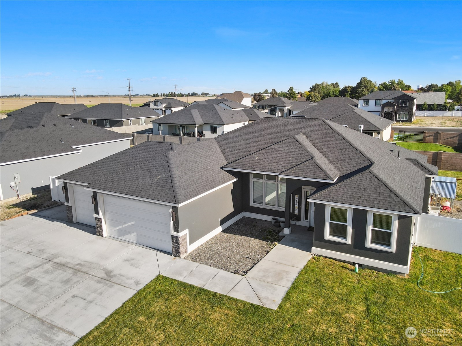 1300 E Mount Othello, WA 99344 - Photo 7 of 36 an aerial view of a house with a yard