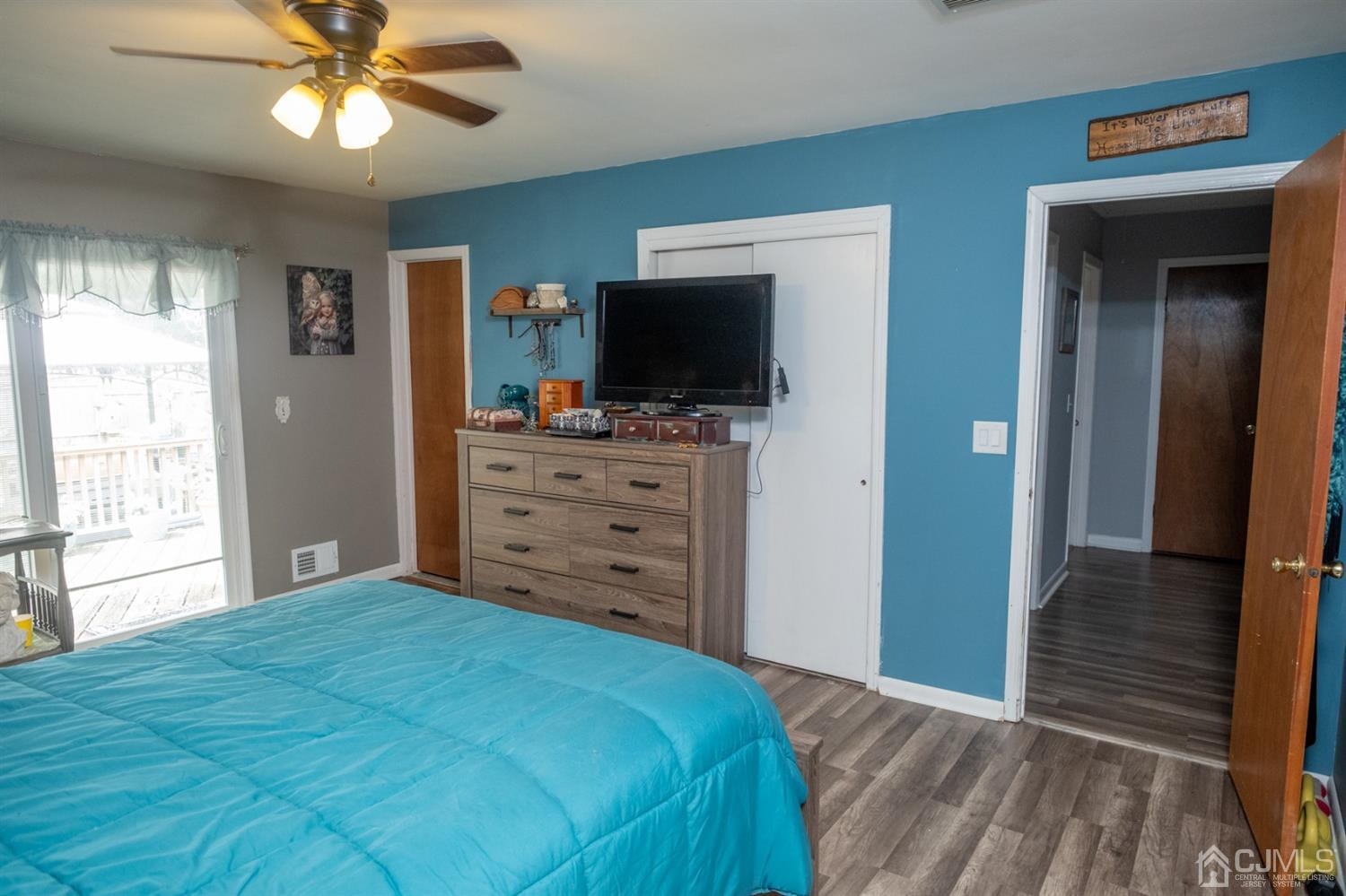 14 Pendleton Place Old Bridge, NJ 08857 - Photo 19 of 48 Master Bedroom (from left to right: sliders that lead to deck/backyard, bathroom entrance door, closet , & entrance door off hallway)