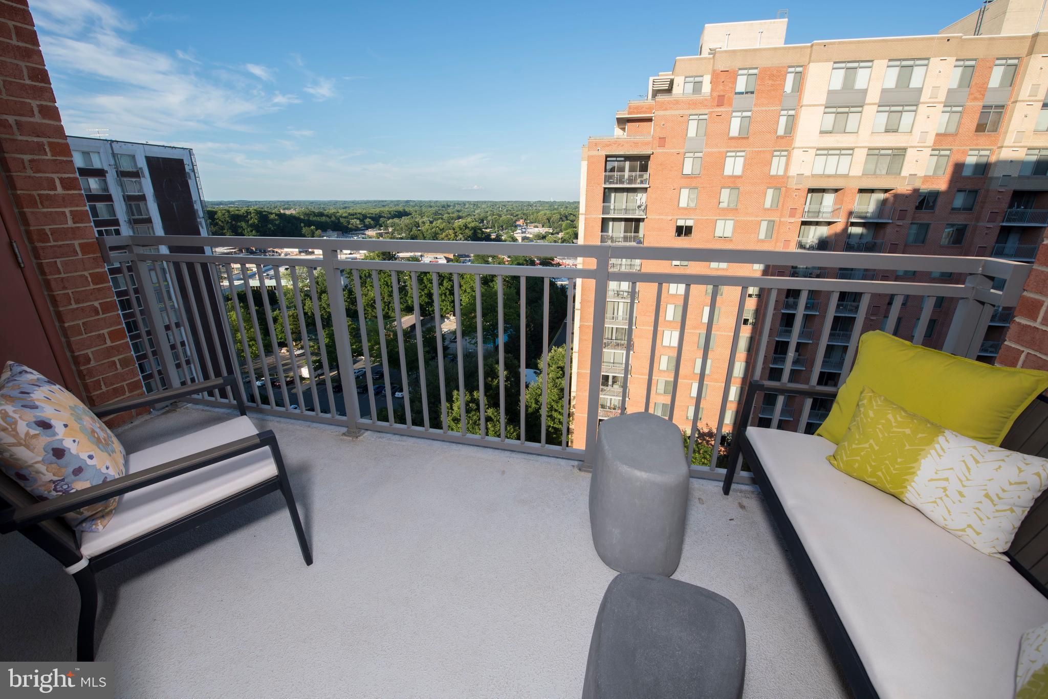 11710 Old Georgetown Road, Unit 1330 North Bethesda, MD 20852 - Photo 19 of 29 a view of balcony with couch