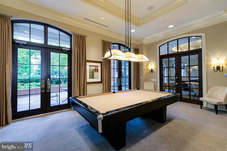 11710 Old Georgetown Road, Unit 1330 North Bethesda, MD 20852 - Photo 26 of 29 a room with pool table and a large window
