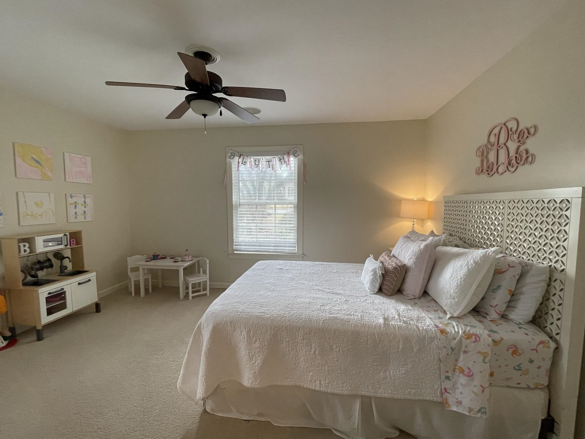 434 Colonial Road Memphis, TN 38117 - Photo 13 of 23 a bedroom with a bed and a table