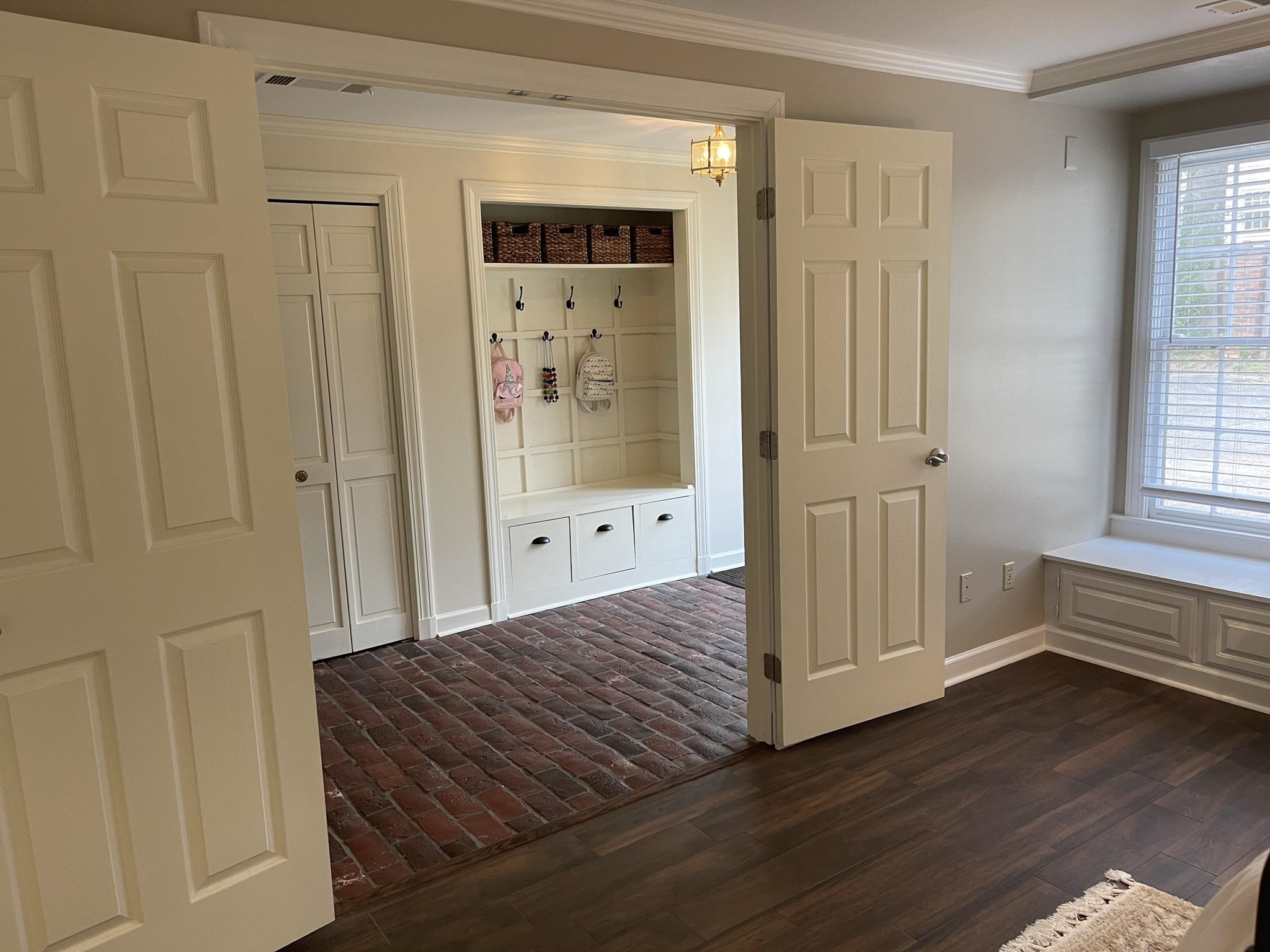 434 Colonial Road Memphis, TN 38117 - Photo 19 of 23 a bedroom with a bed and wooden floor