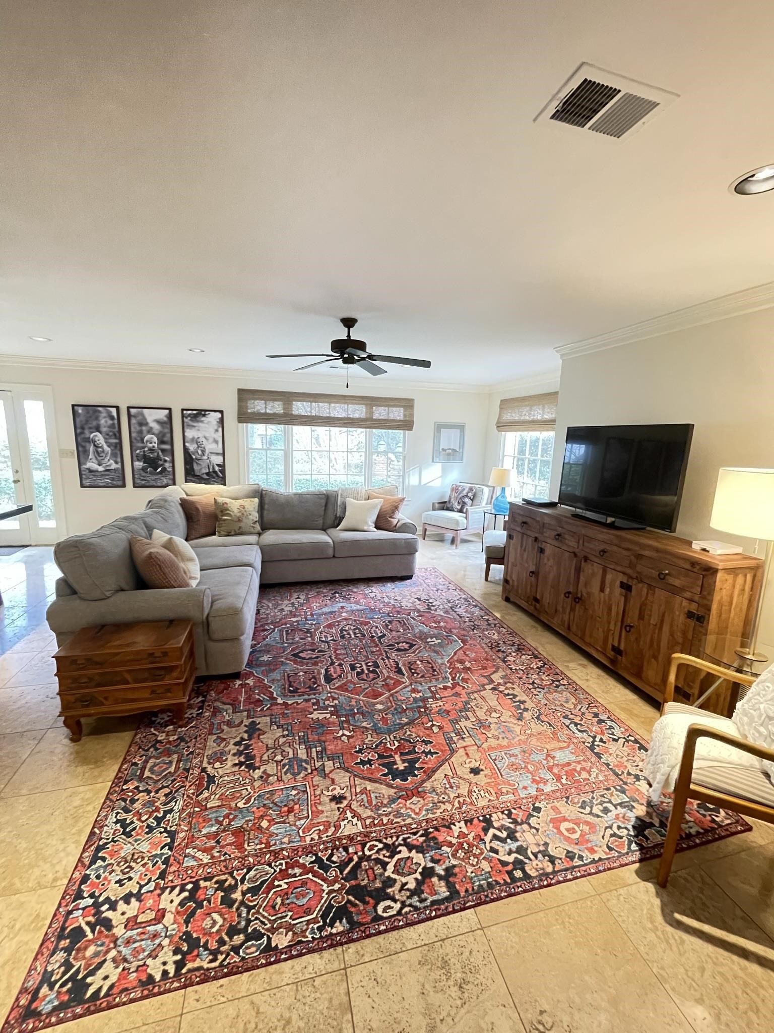 434 Colonial Road Memphis, TN 38117 - Photo 6 of 23 a living room with furniture and a flat screen tv