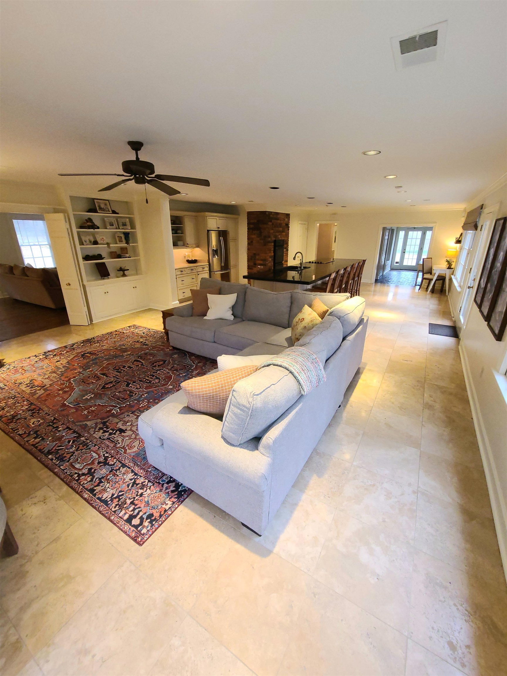 434 Colonial Road Memphis, TN 38117 - Photo 8 of 23 a living room with furniture and a flat screen tv