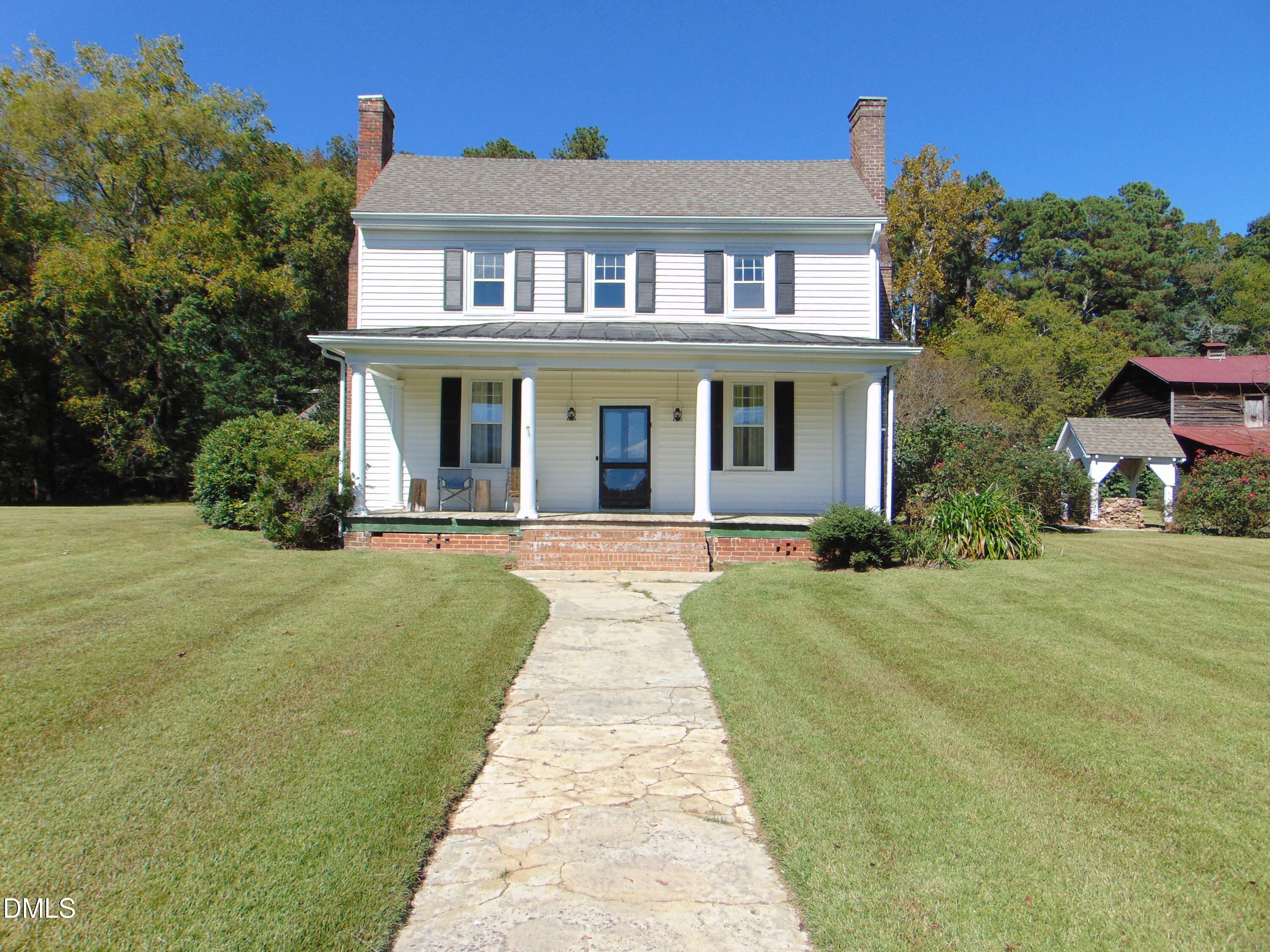 4067 Chewning Road Oxford, NC 27565 - Photo 41 of 82 a front view of a house with garden