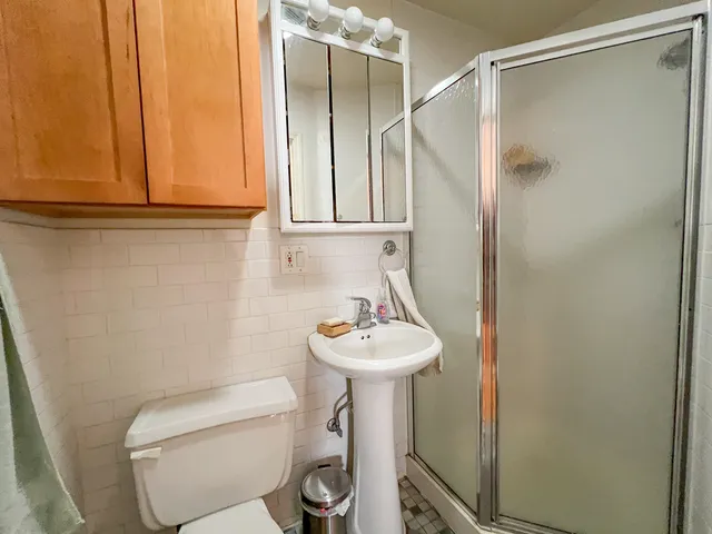 a bed room with a bed and furniture