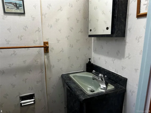 a park view with iron fence