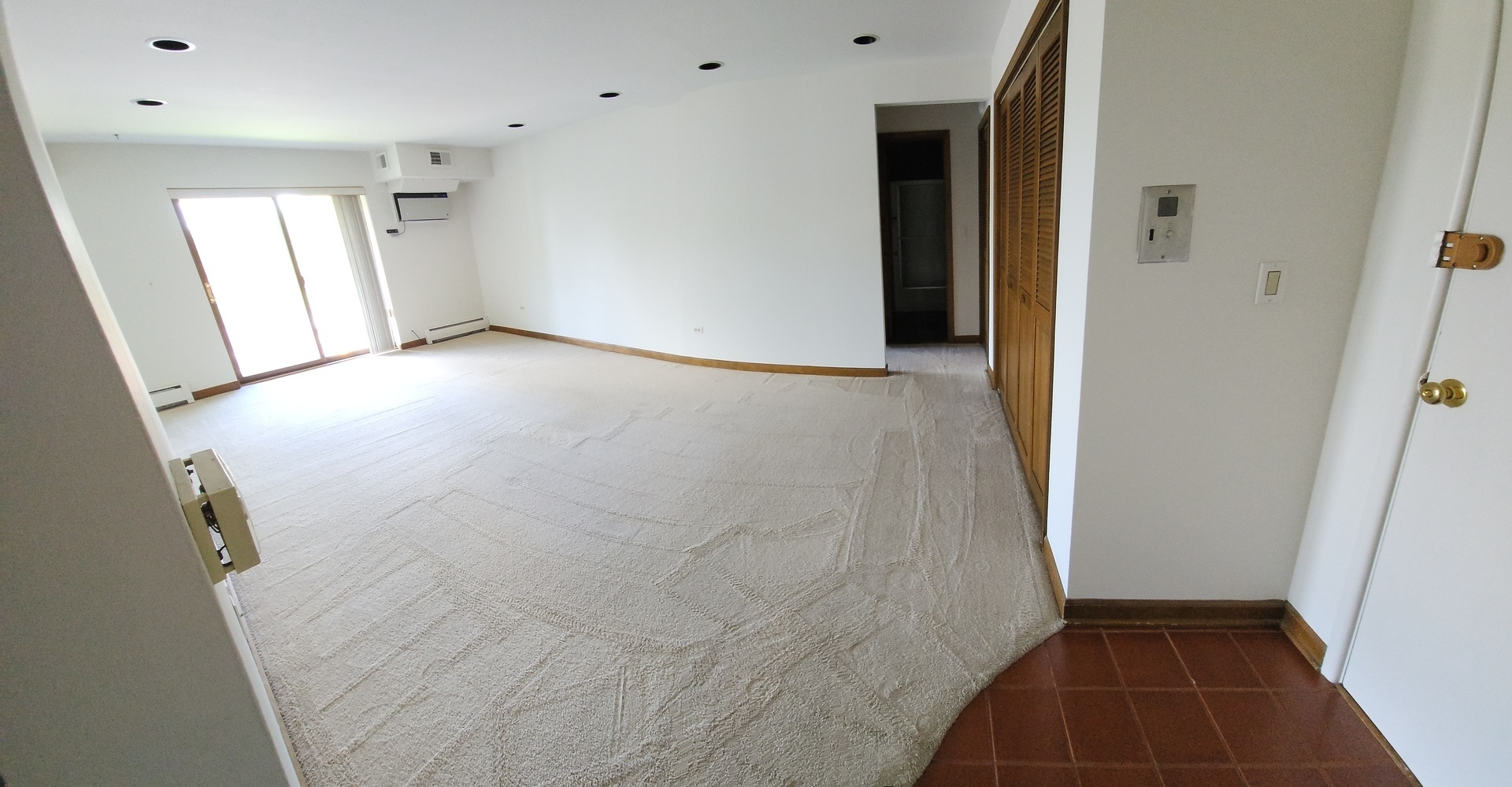 2424 East Oakton Street, Unit 3C Arlington Heights, IL 60004 - Photo 2 of 5 wooden floor in an empty room