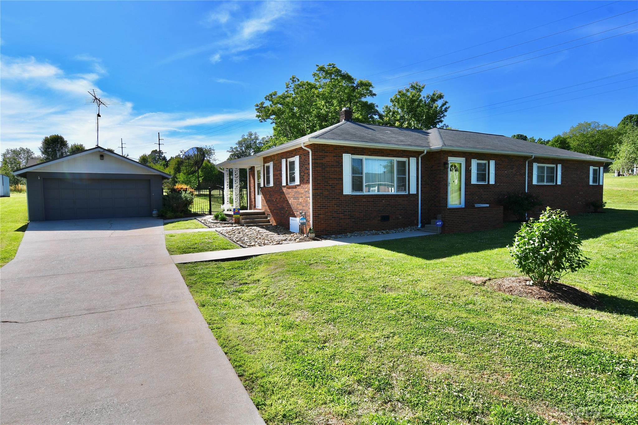 109 Whitley Road Morganton, NC 28655 - Photo 1 of 14 a house view with a garden space