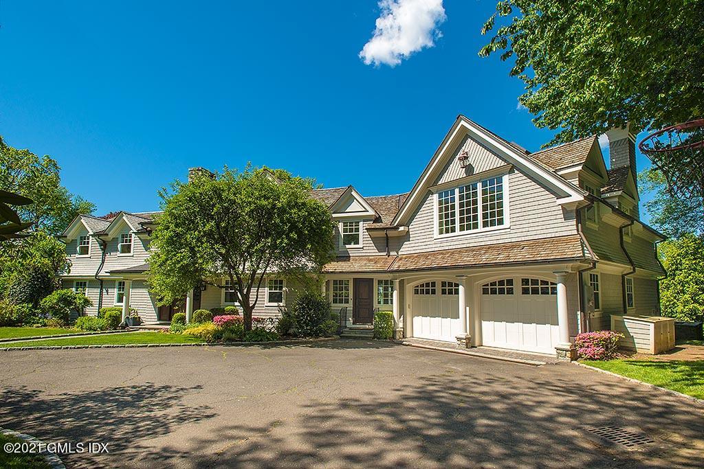27 Leeward Lane Riverside, CT 06878 - Photo 27 of 38 a front view of a house with a yard