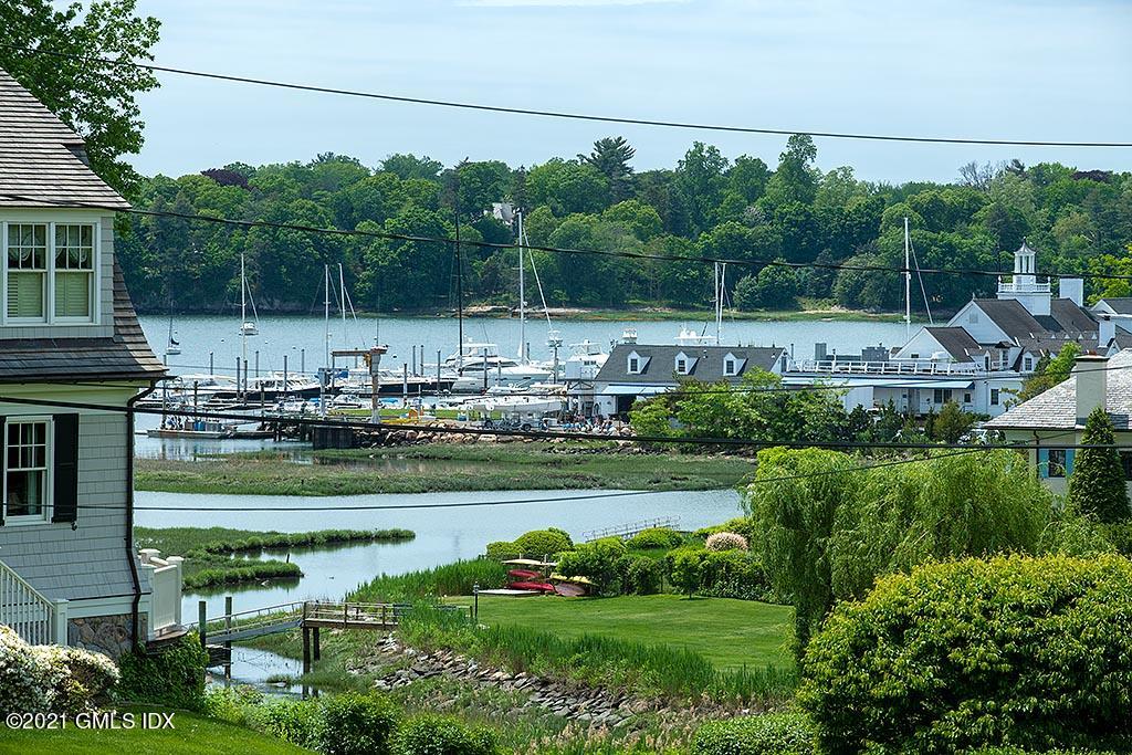 27 Leeward Lane Riverside, CT 06878 - Photo 4 of 38 a view of a garden with a lake