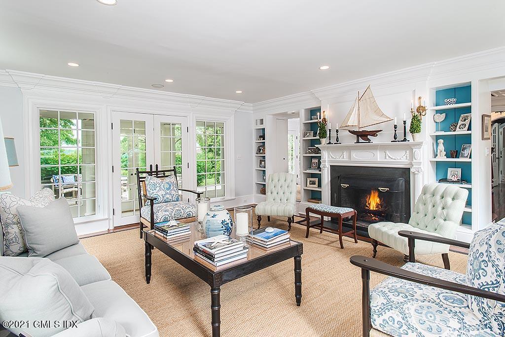 27 Leeward Lane Riverside, CT 06878 - Photo 7 of 38 a living room with furniture and a fireplace