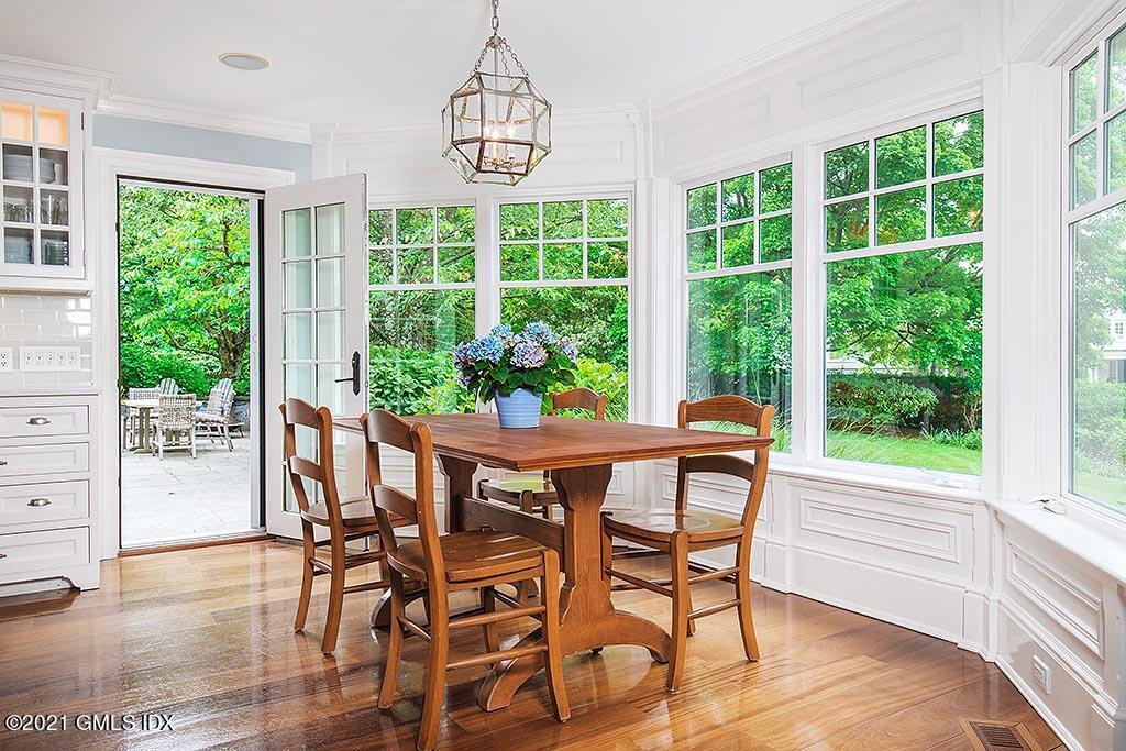 27 Leeward Lane Riverside, CT 06878 - Photo 8 of 38 a view of a dining room with furniture window and outside view